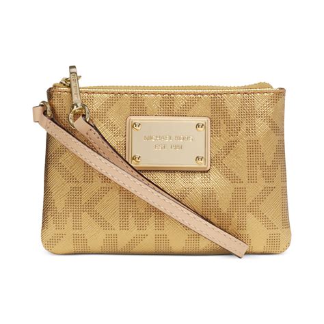 michael kors gold snakeskin clutch|Michael Kors gold wristlets.